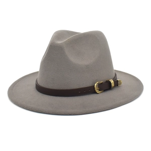 Detailed view of gray wool fedora hat featuring a brown leather strap with golden buckle