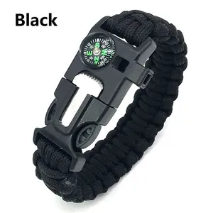 Black survival paracord bracelet with integrated compass whistle and flint scraper