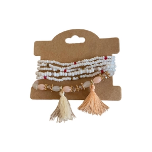 Bohemian multi-layer crystal bead bracelet set with pink accents and coral tassels