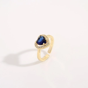 Gold plated brass heart ring with blue gemstone and white zircon accents for women
