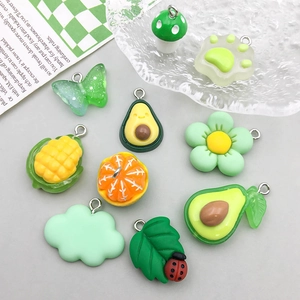 Colorful resin charms including avocado and mushroom for DIY jewelry making