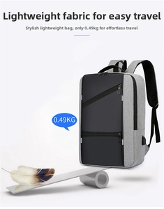 Lightweight laptop backpack with USB port shown with a feather to emphasize low weight