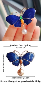 Detail showing dimensions of blue enamel butterfly brooch with a hanging pearl charm