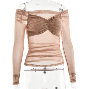 Detailed view of beige sheer mesh off-shoulder top with ruched texture on mannequin