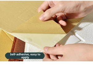 Detail of self-adhesive 3D brick foam wall sticker showing the adhesive backing and texture