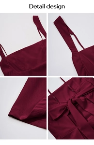 Detail of wine red dress featuring adjustable straps and a large decorative bow on the back
