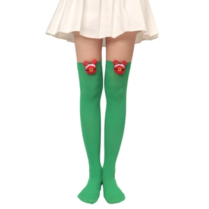 Detail of Christmas thigh high socks in green with a festive mouse doll attachment