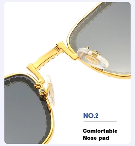 Close-up of comfortable silicone nose pads on gold square frame sunglasses