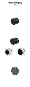 Detail view of magnetic stainless steel earrings featuring Roman numerals and geometric shapes