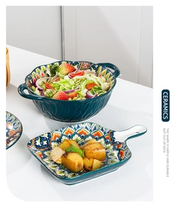 Ceramic bohemian tableware set featuring mandala patterns with fresh salad and roasted potatoes