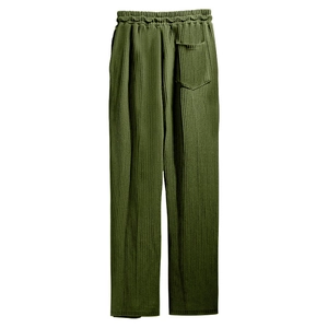 Detailed view of the olive green ribbed texture and back pocket on men's trousers