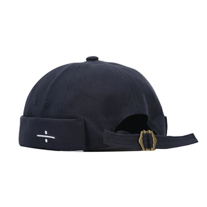 Dark blue canvas Miki Hat with white embroidery and adjustable metal buckle strap