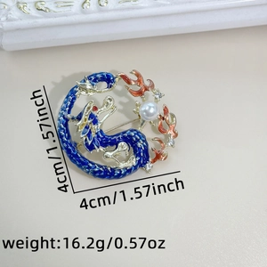 Macro shot of 4cm blue dragon brooch with pearl and crystal detail and dimensions