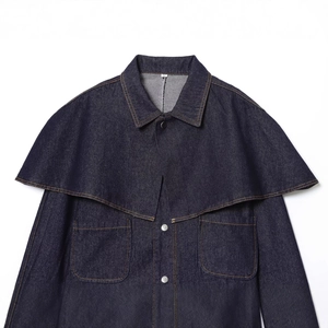 Fashionable dark blue denim cape jacket with metal snap buttons and front patch pockets