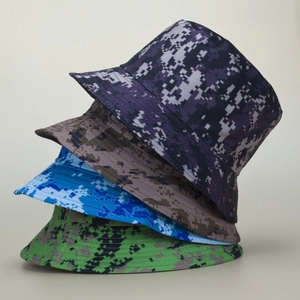 Macro detail of four digital camouflage bucket hats in purple, brown, blue and green
