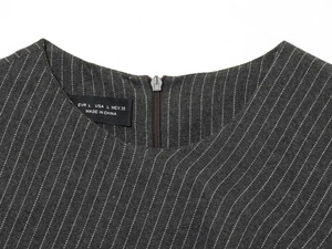 Detail of grey striped midi dress neckline with back zipper and size L label