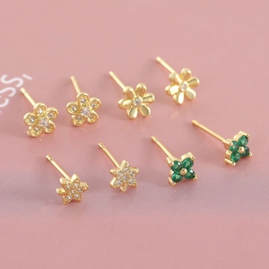 Sparkling flower and star zircon stud earring set in gold-plated finish for women