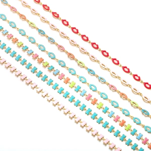 Golden stainless steel chains with colorful enamel butterfly and lip charms on white