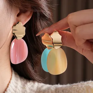 Minimalist irregular acrylic earrings with gold wavy metal and colorful resin pendants