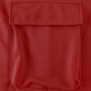 Detailed close-up of the red cargo pants pocket showing high-quality stitching and fabric