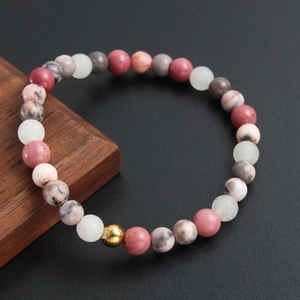 Natural rhodochrosite beaded bracelet with pink, grey stones and a gold accent bead