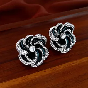 Vintage floral stud earrings featuring black enamel petals with sparkling crystal accents