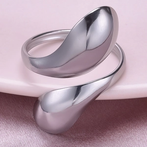 Macro view of silver teardrop open ring in polished 304 stainless steel with mirror finish