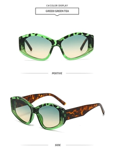 Detail view of tea-colored lenses with green leopard print geometric frames