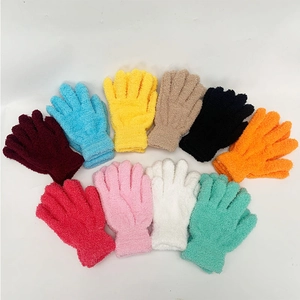 Detailed view of ten colorful winter coral fleece gloves with elastic ribbed wrist cuffs