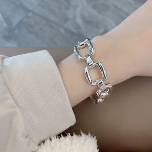 Modern chunky silver chain bracelet for women with heavy link design on wrist