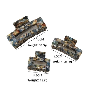 Three-piece acetate hair claw set with marble pattern in sizes 10cm, 7.5cm and 5.2cm