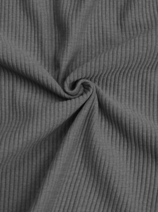 Macro shot of grey ribbed knit fabric texture showing fine vertical stripes and drape