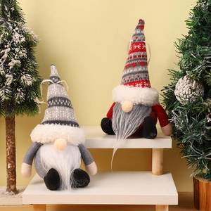 Detail of Christmas gnomes featuring striped and heart-patterned knitted hats with white beards