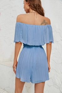 Rear view of light blue off-shoulder pleated romper showing textured chiffon fabric details