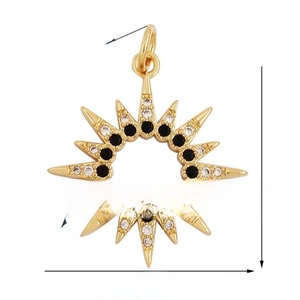 Golden sunburst pendant detail showing 21mm diameter and black white crystal inlay