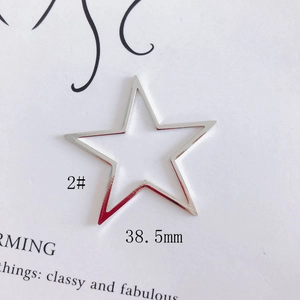 Detail view of 38.5mm silver hollow star charm with size measurements for DIY jewelry