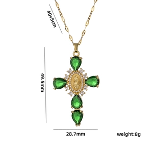 Gold cross necklace with green pear-shaped gems and Virgin Mary relief on white background