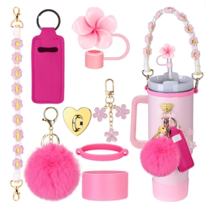Close-up of pink flower straw cover and daisy woven handle on Stanley cup set