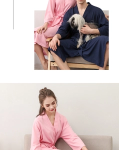 Detail of waffle weave texture on pink and navy blue lightweight couple bathrobes