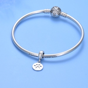 925 silver bracelet with paw print pendant and unique as you are engraving