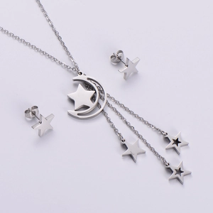 Polished silver crescent moon and star pendant necklace with long tassel chain and stud earrings