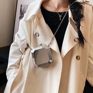Silver geometric faceted acrylic box bag with mirror finish and bead chain strap