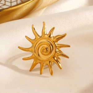 Golden sunburst spiral ring in stainless steel with a vintage ethnic-style design