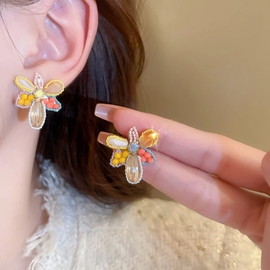 Boucles d'oreilles fleur en cristal avec perles colorées et bordure tressée