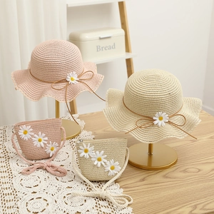 Straw sun hat and bag set with white daisy floral accents for kids in beige and pink