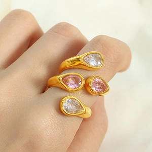 18k gold plated stainless steel open ring with teardrop zircon on a model's hand