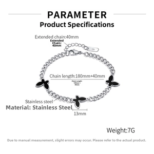 Detail of stainless steel butterfly bracelet with black charms and O-chain links