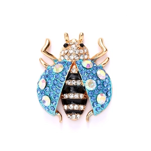 Exquisite ladybug brooch featuring colorful rhinestones and gold-plated metal finish
