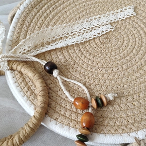 Minimalist round woven straw tote bag with elegant lace bow and beaded tassel ornament