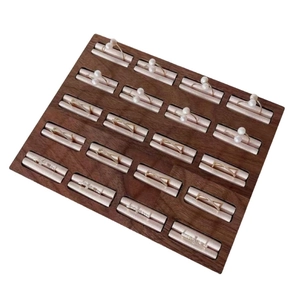 Walnut wood ring display tray with multiple slots for jewelry organization and showcase